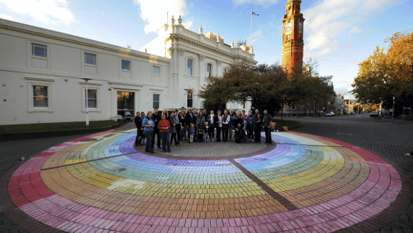 Launceston brightened by a chalk rainbow